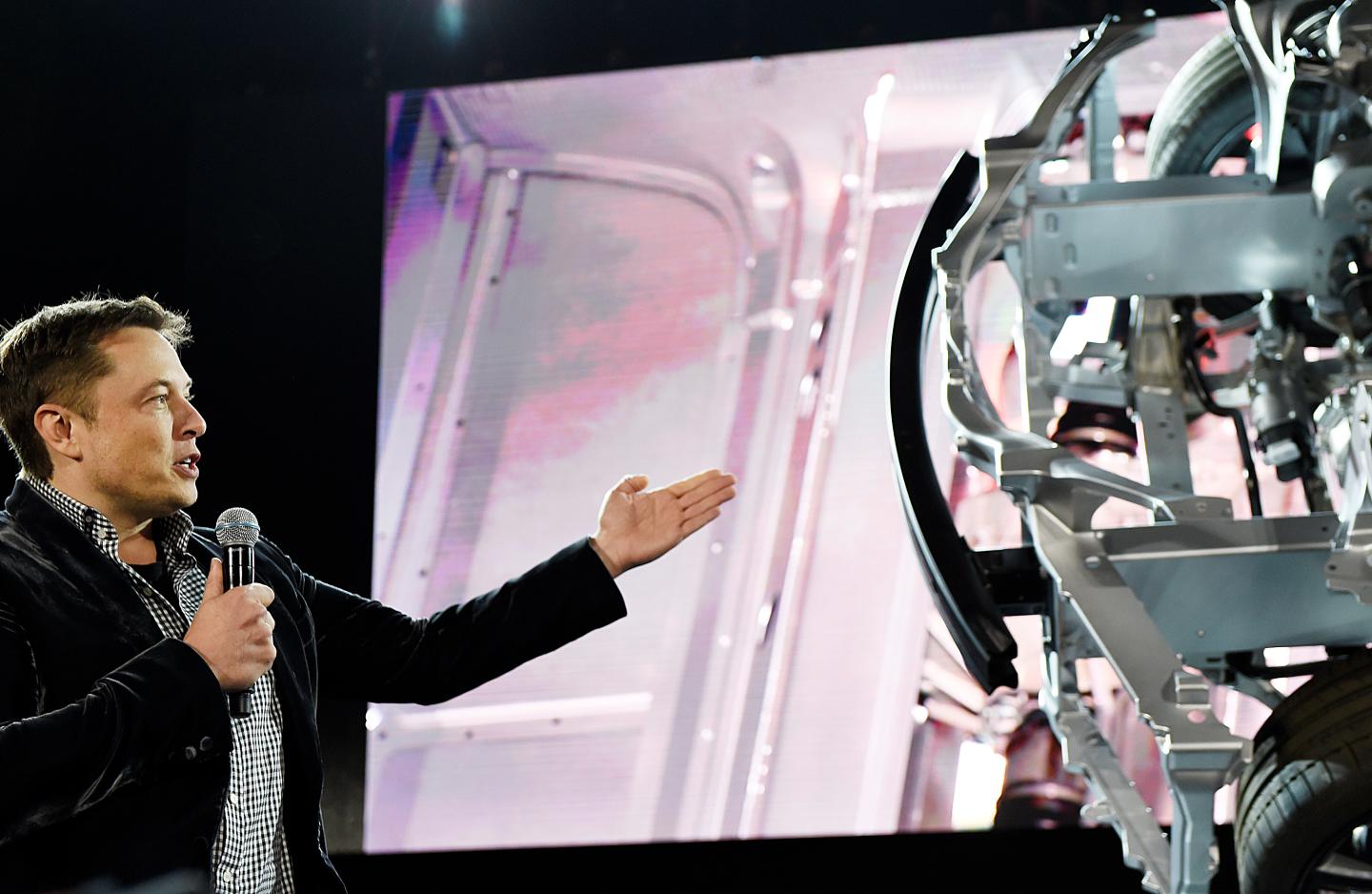 Telsa CEO Elon Musk Unveils New Vehicle
