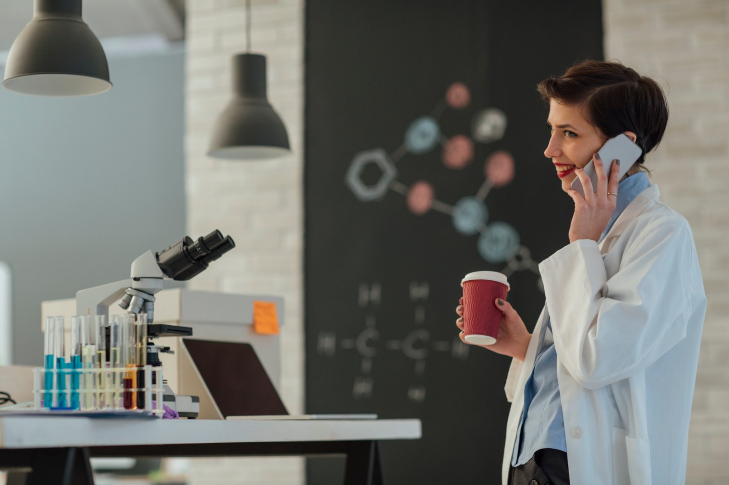 Female Researcher Working In Her Lab.