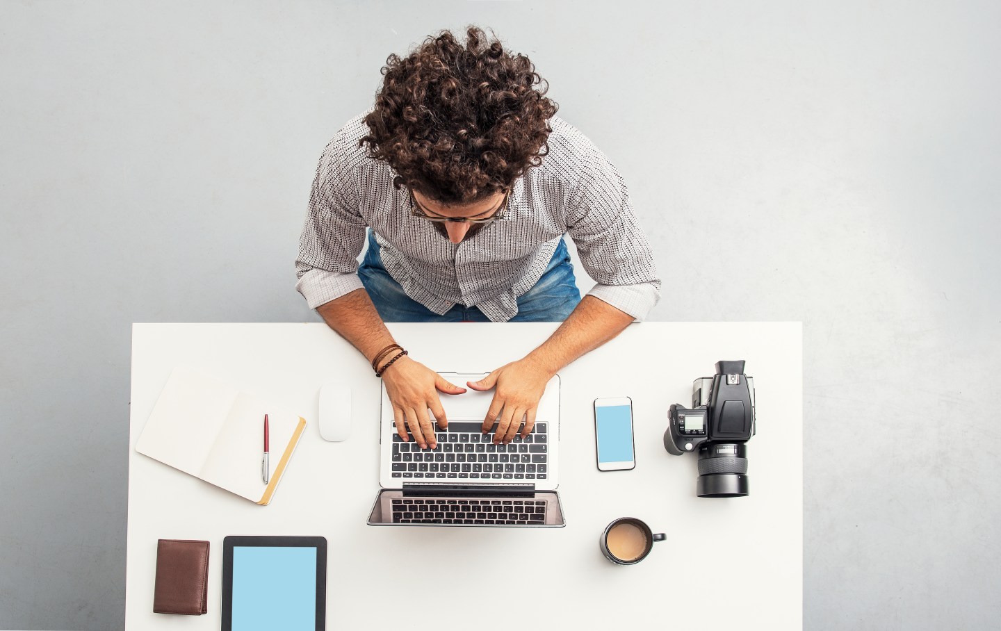 Man working at home office with laptop