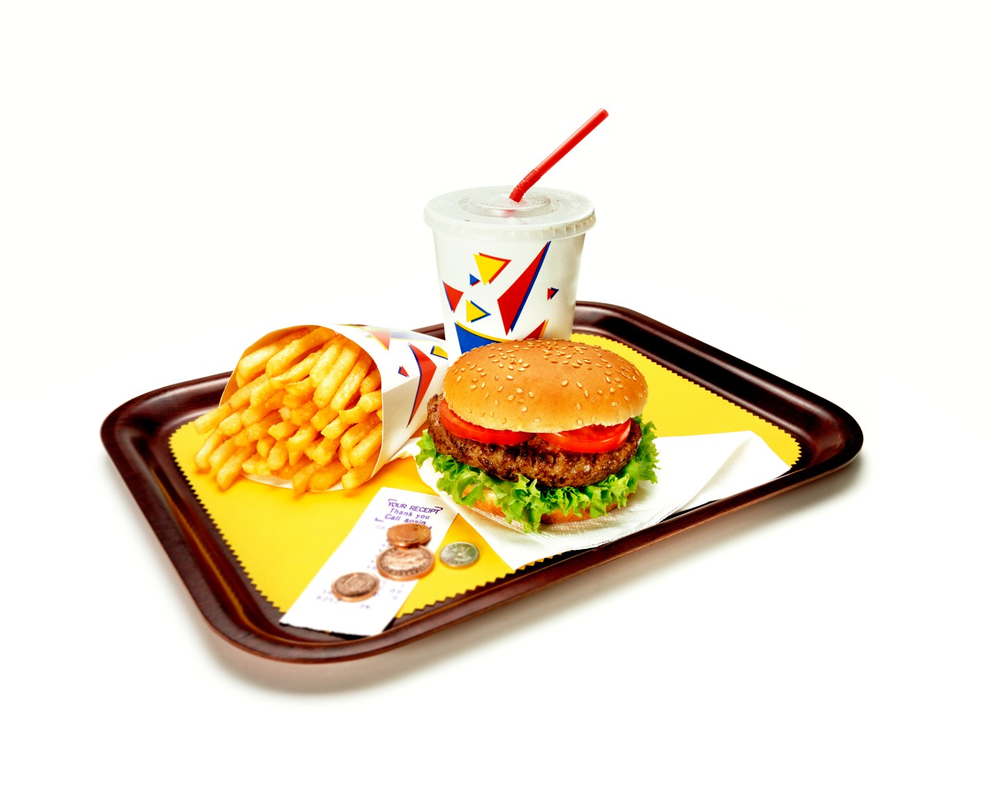Burger, fries and soda on tray.