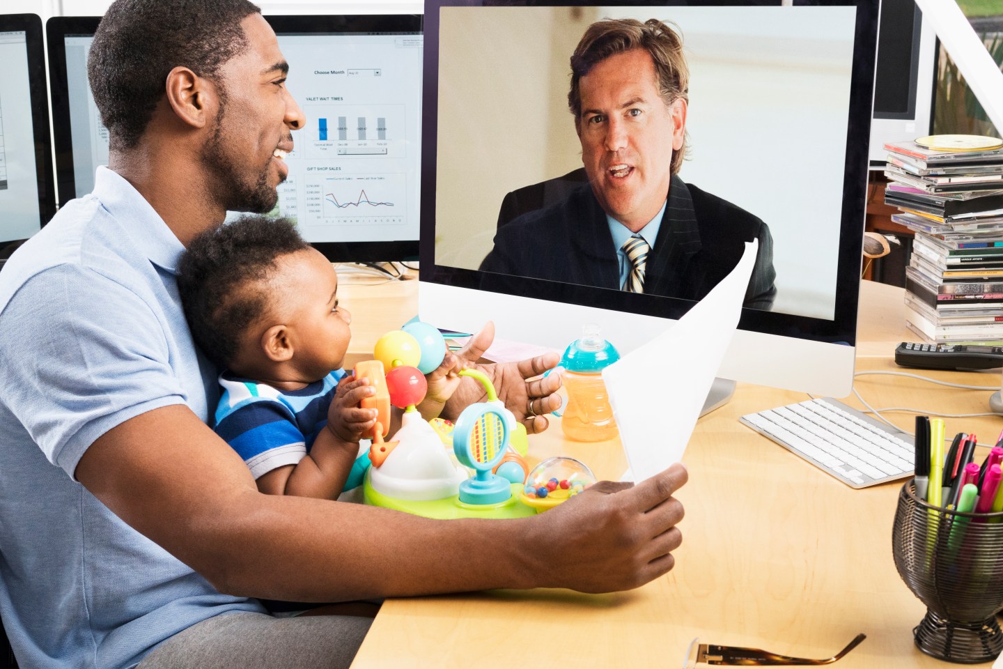 Father with son working from home