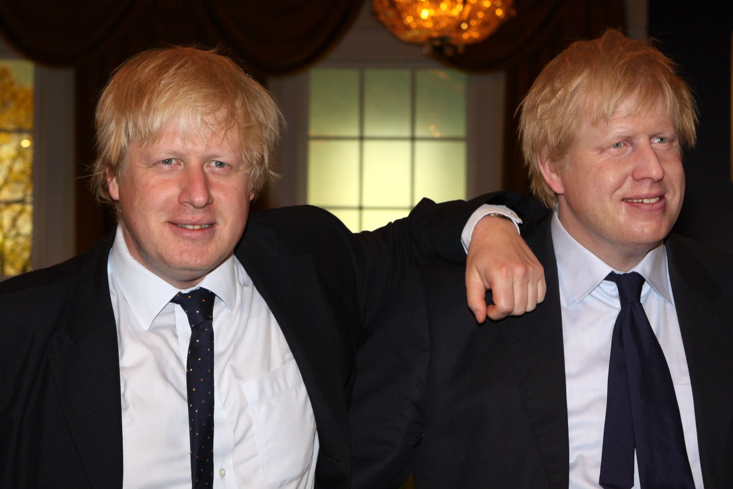 Boris Johnson Meets His Mirror Image At Madame Tussuads