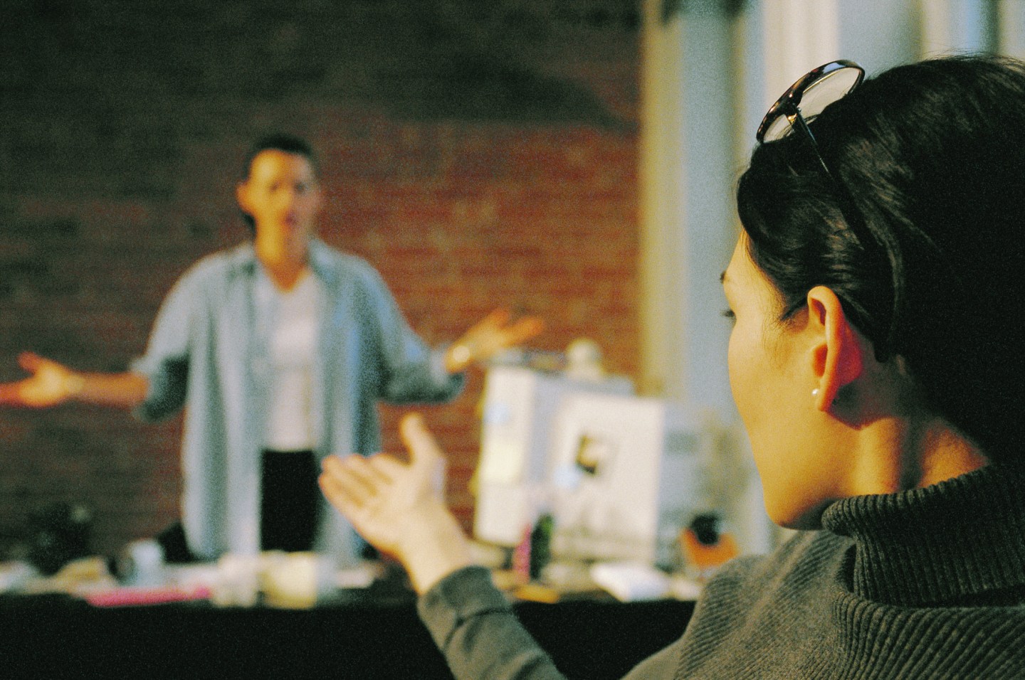 Two businesswomen talking in office