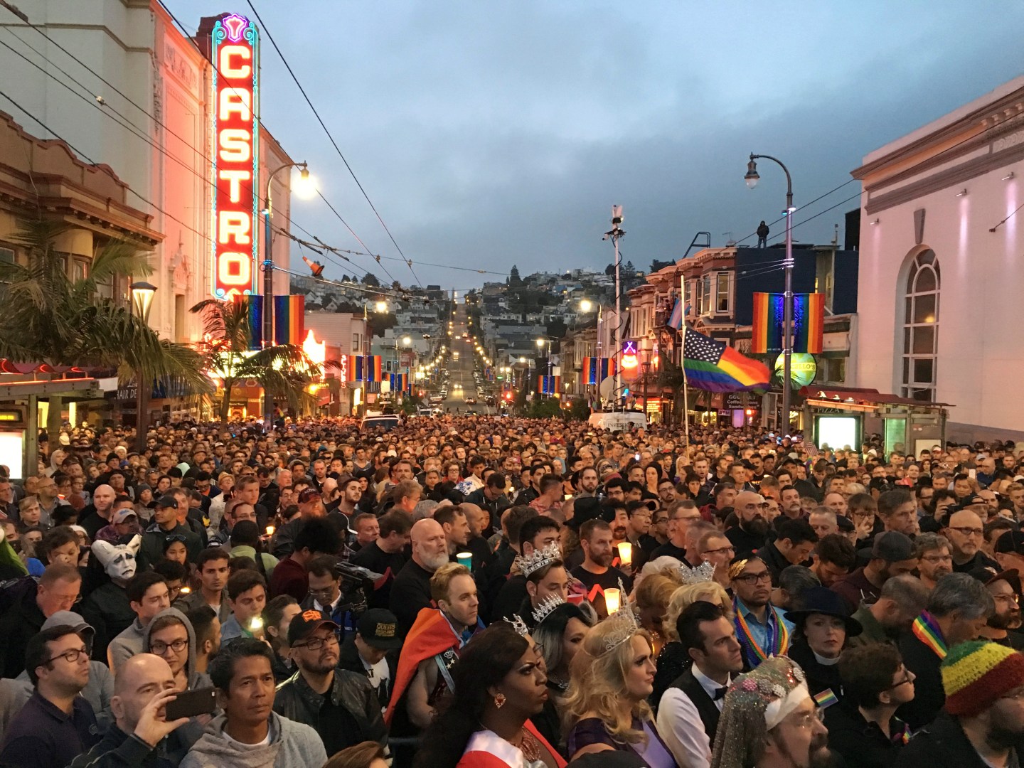 People gather in the Castro District for a vigil for the victims of the Orlando shooting at a gay nightclub, in San Francisco