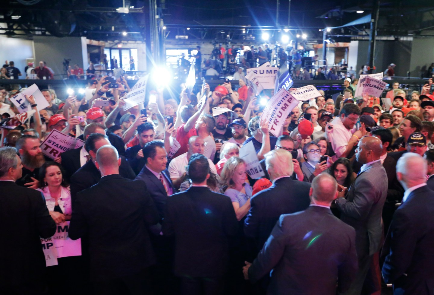 Republican U.S. Presidential candidate Donald Trump greets the crowd at a campaign rally at Gilley's in Dallas