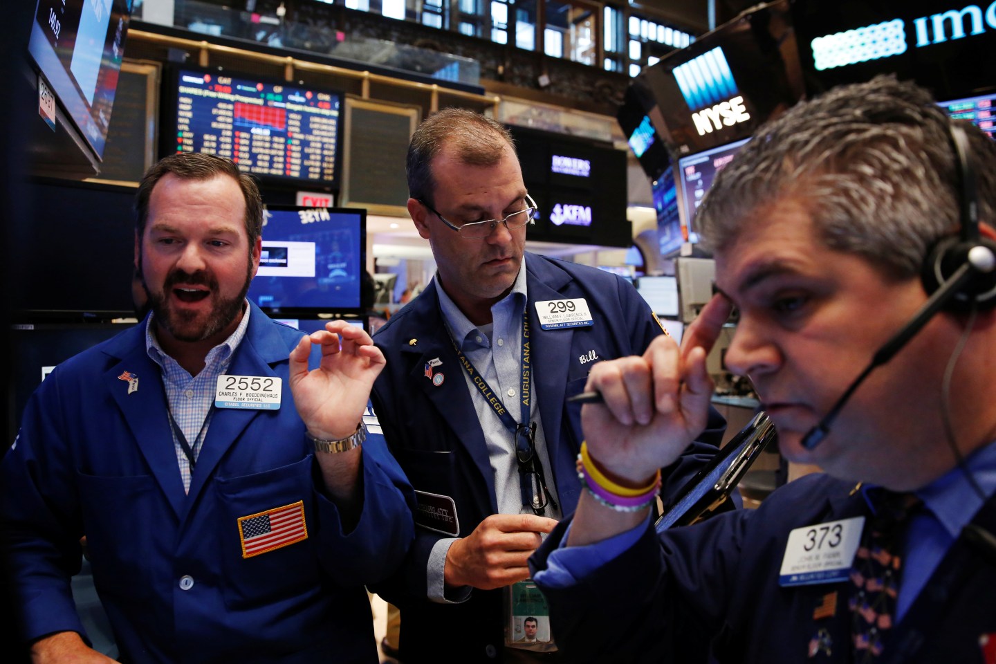Traders work on the floor of the New York Stock Exchange (NYSE) in New York