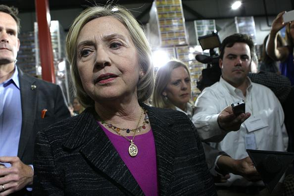 Hillary Clinton answers questions from the press about the Bengazi emails after a discussion with members of the local small community at Smuttynose Brewery, in Hampton, N.H. (Photo by Joanne Rathe/The Boston Globe via Getty Images)