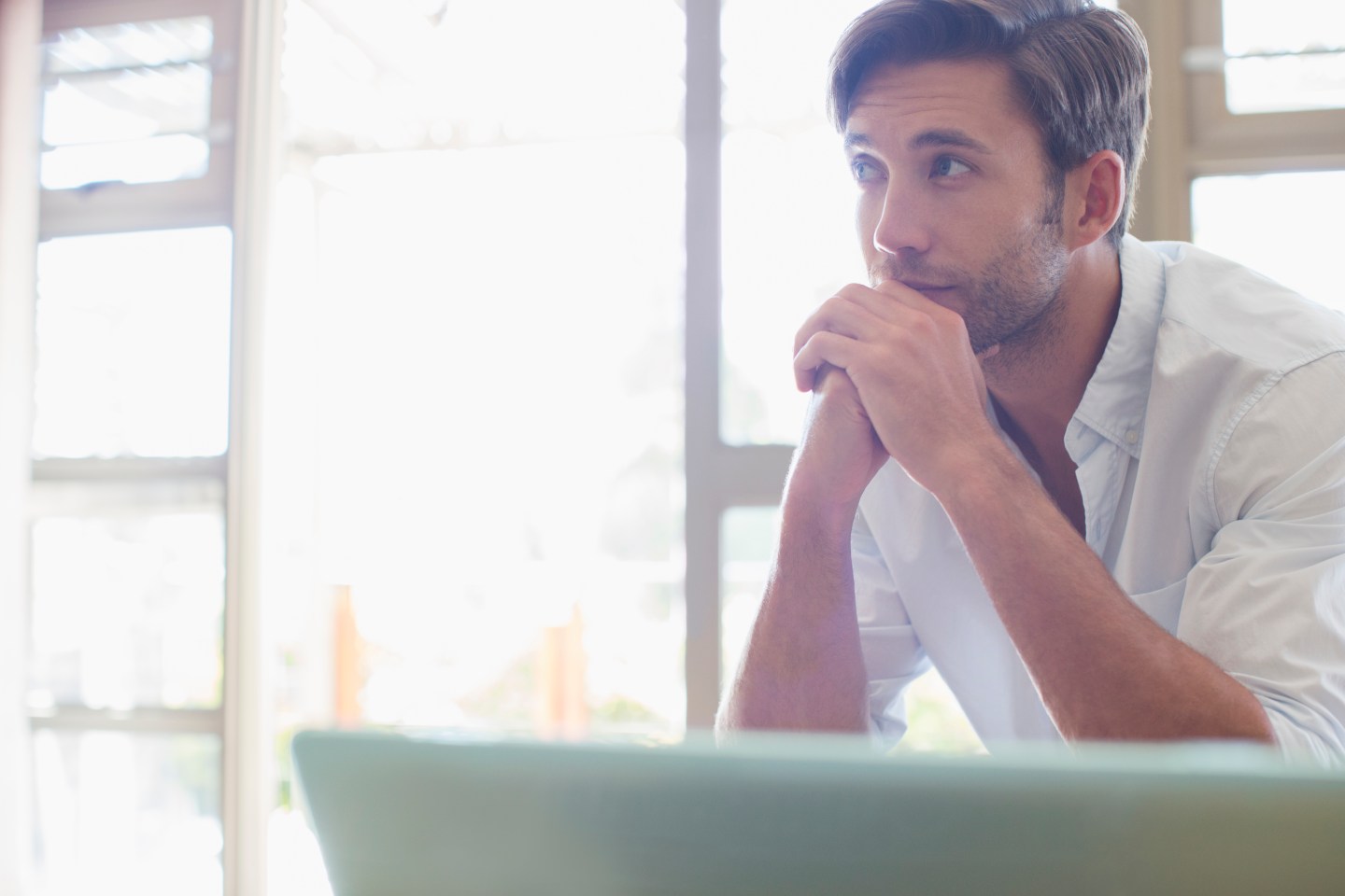 Man sitting at laptop