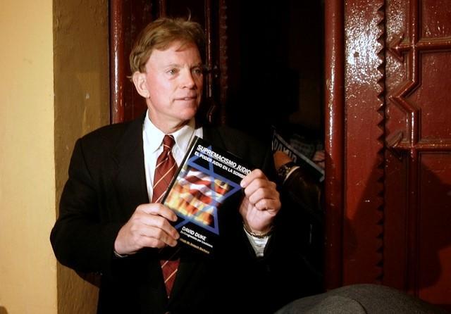 Duke, former Republican member of the Louisiana House of Representatives and former Grand Wizard of the Knights of the Ku Klux Klan, speaks to journalists on a street in central Barcelona