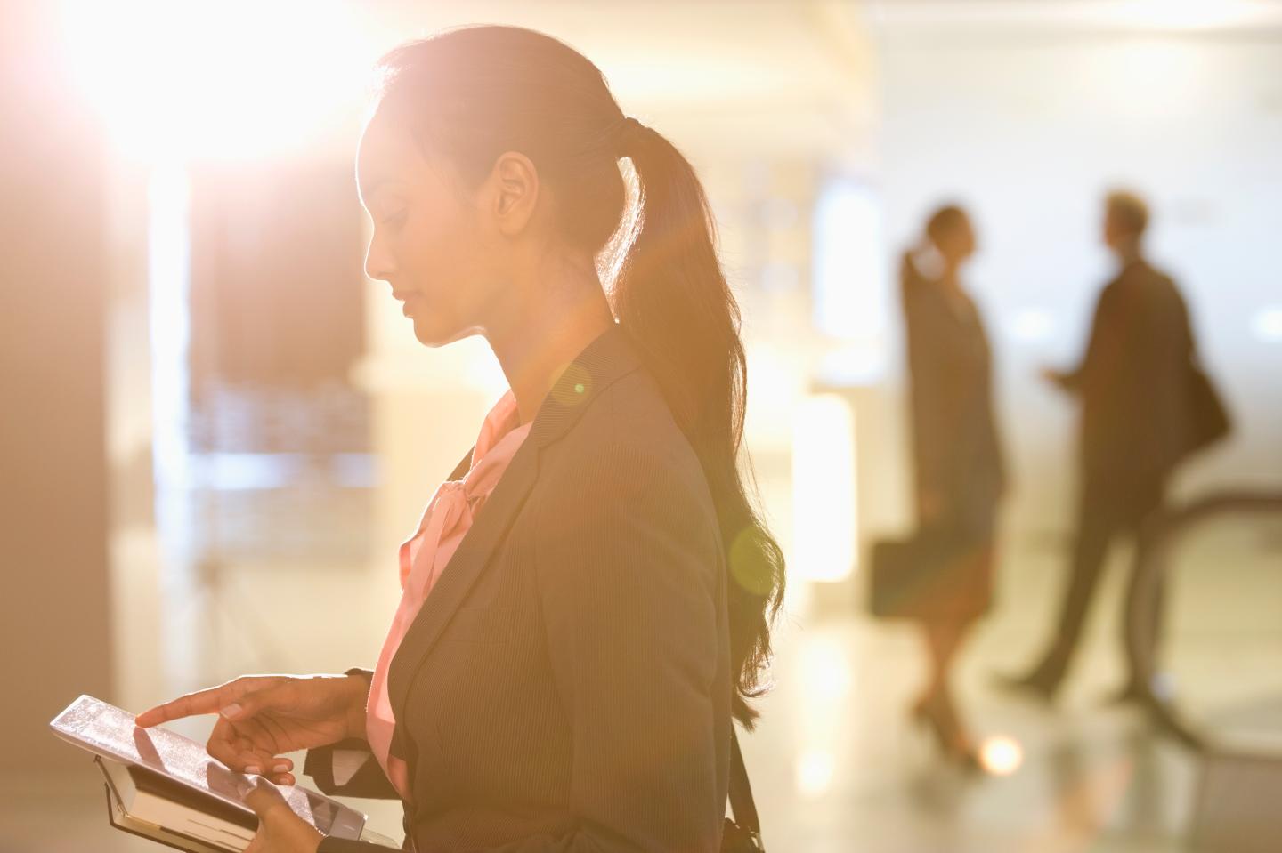 Businesswoman using digital tablet