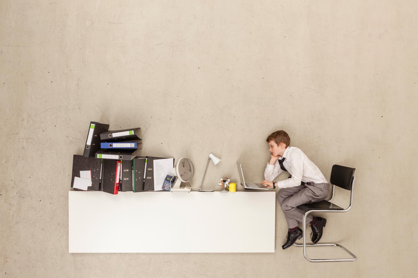Business boy using laptop