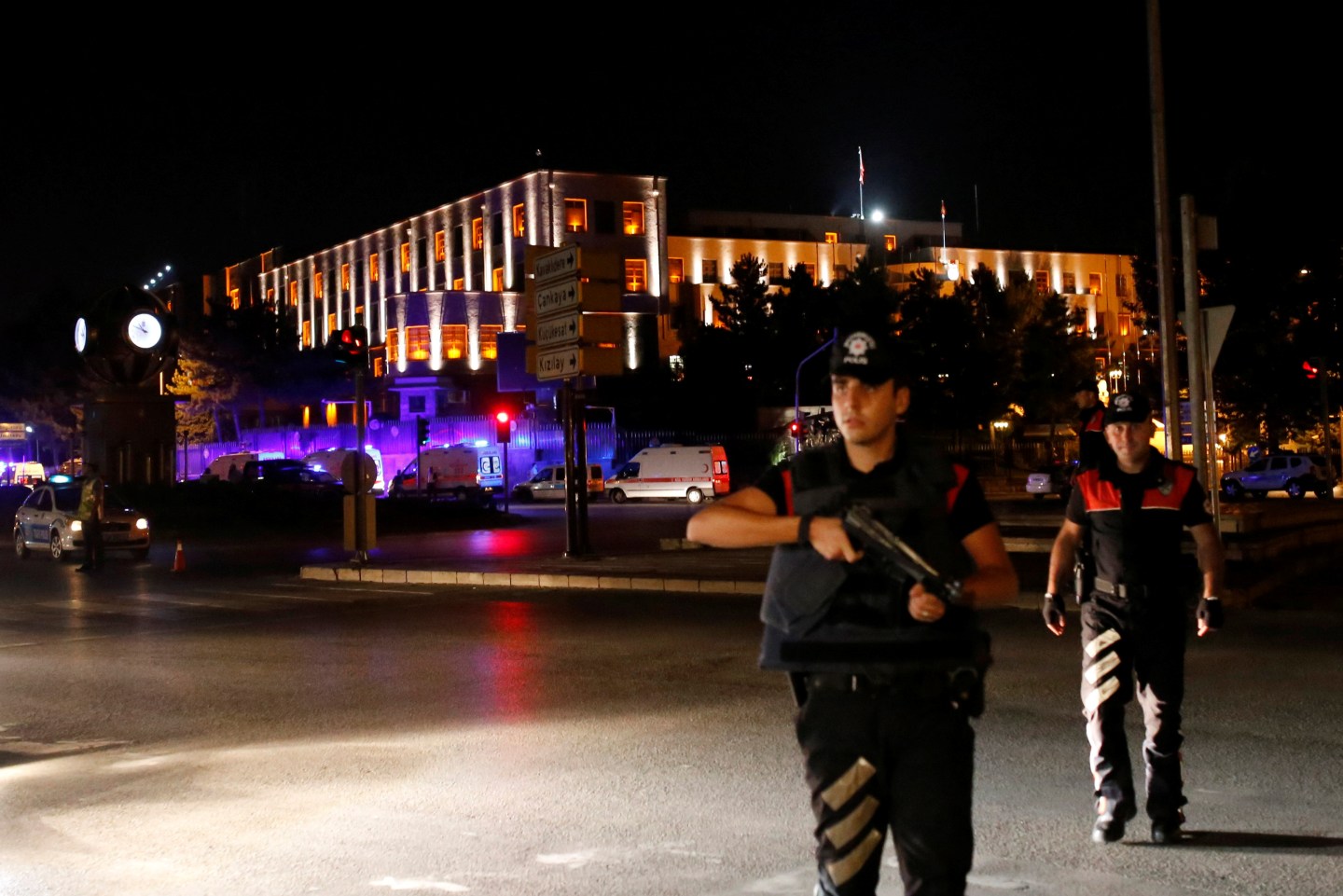 Police officers stand guard near the Turkish military headquarters in Ankara