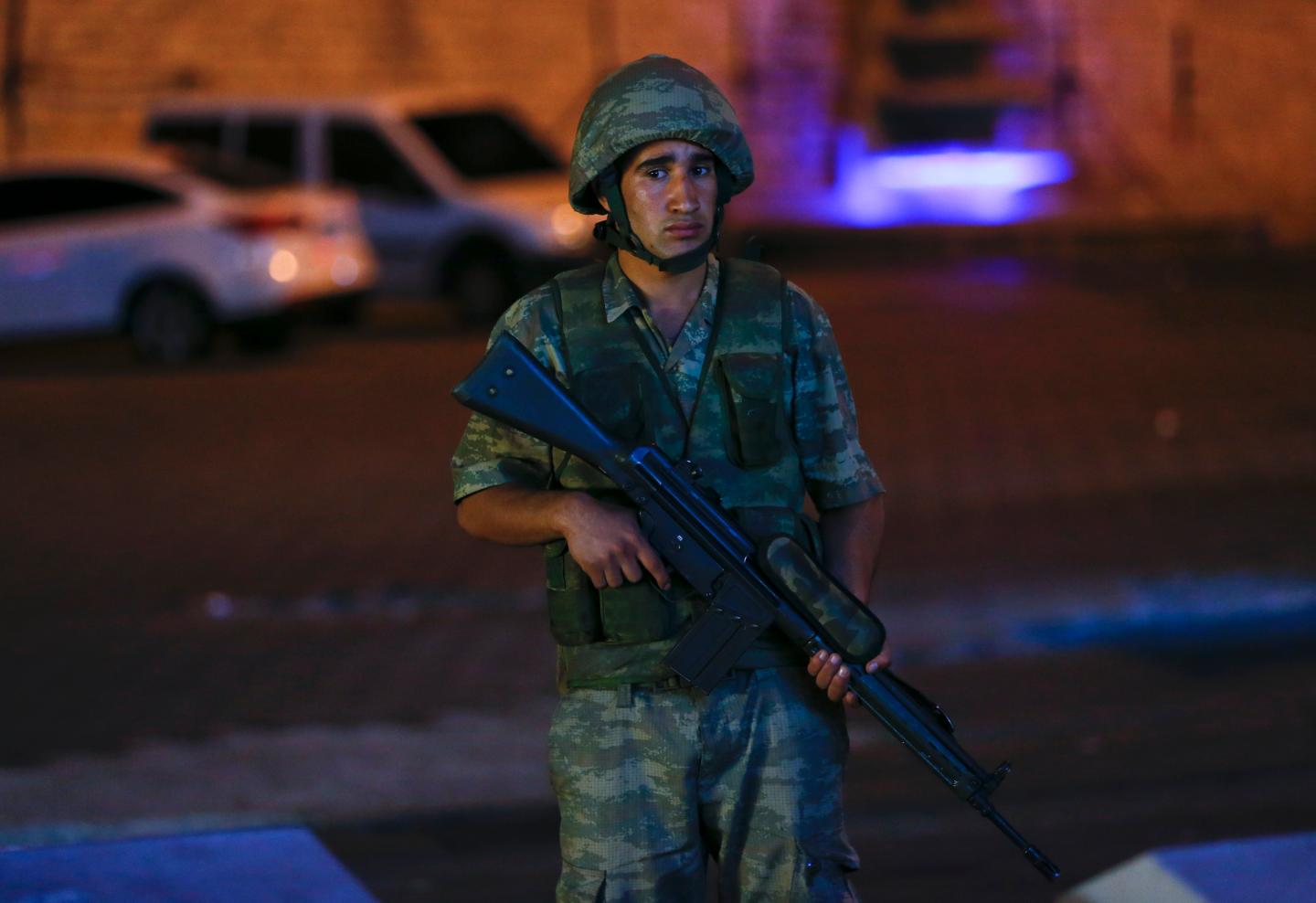 A Turkish military stands guard near the Taksim Square in Istanbul