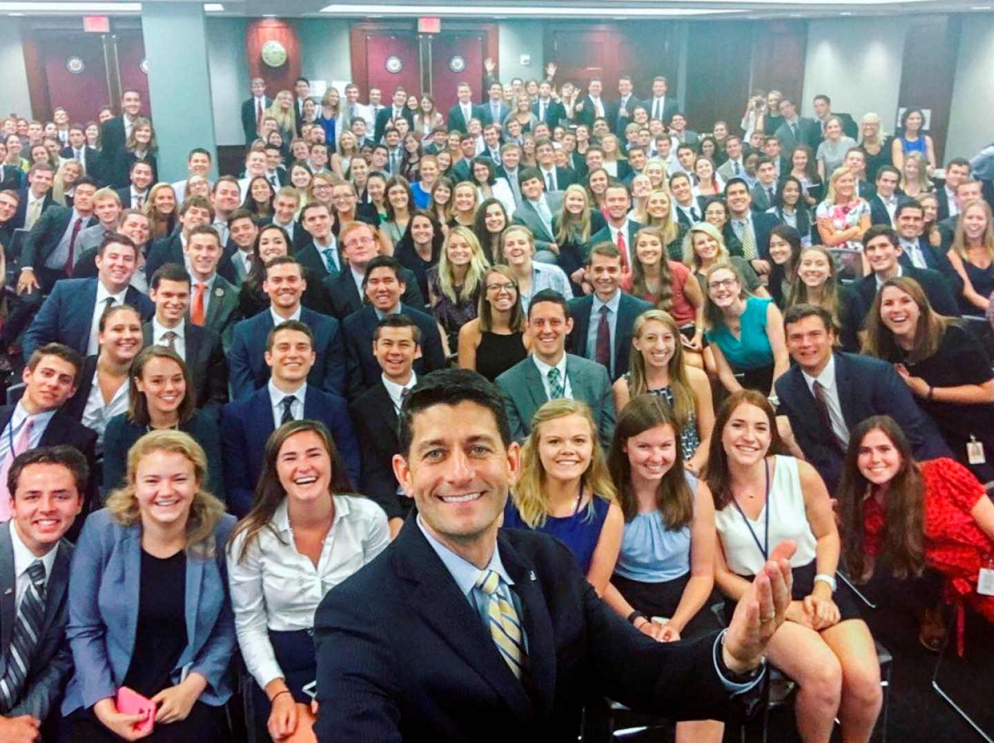 A group of Capitol Hill interns pose for a picture taken by Republican Speaker of the House Paul Ryan