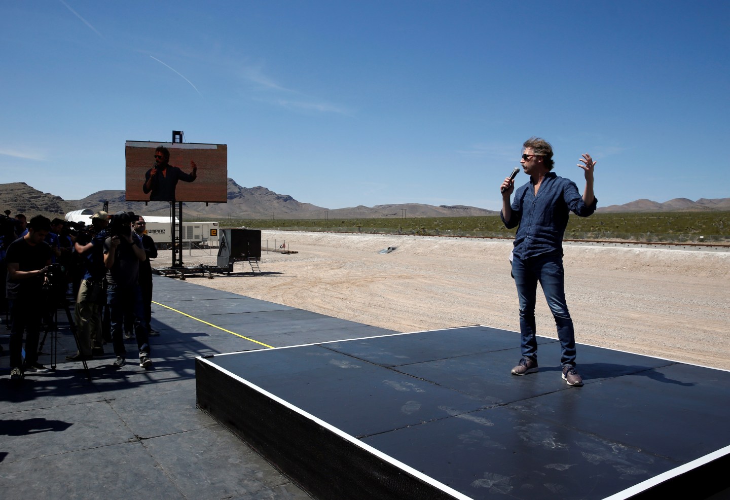 Hyperloop One co-founder Brogan BamBrogan speaks following a propulsion open-air test at Hyperloop One in North Las Vegas