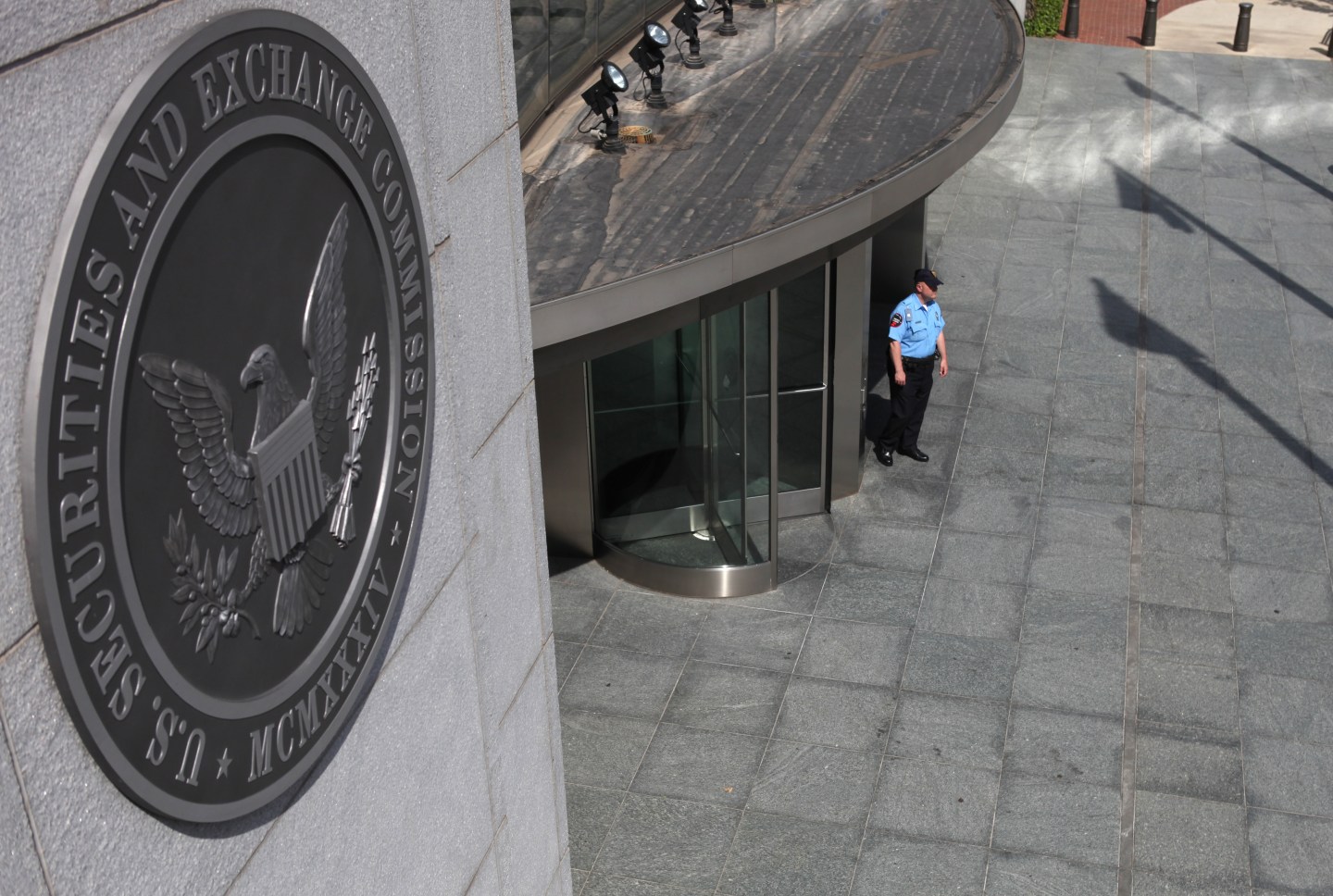 A security officer stands outside the U.S. Securities and Exchange Commission headquarters