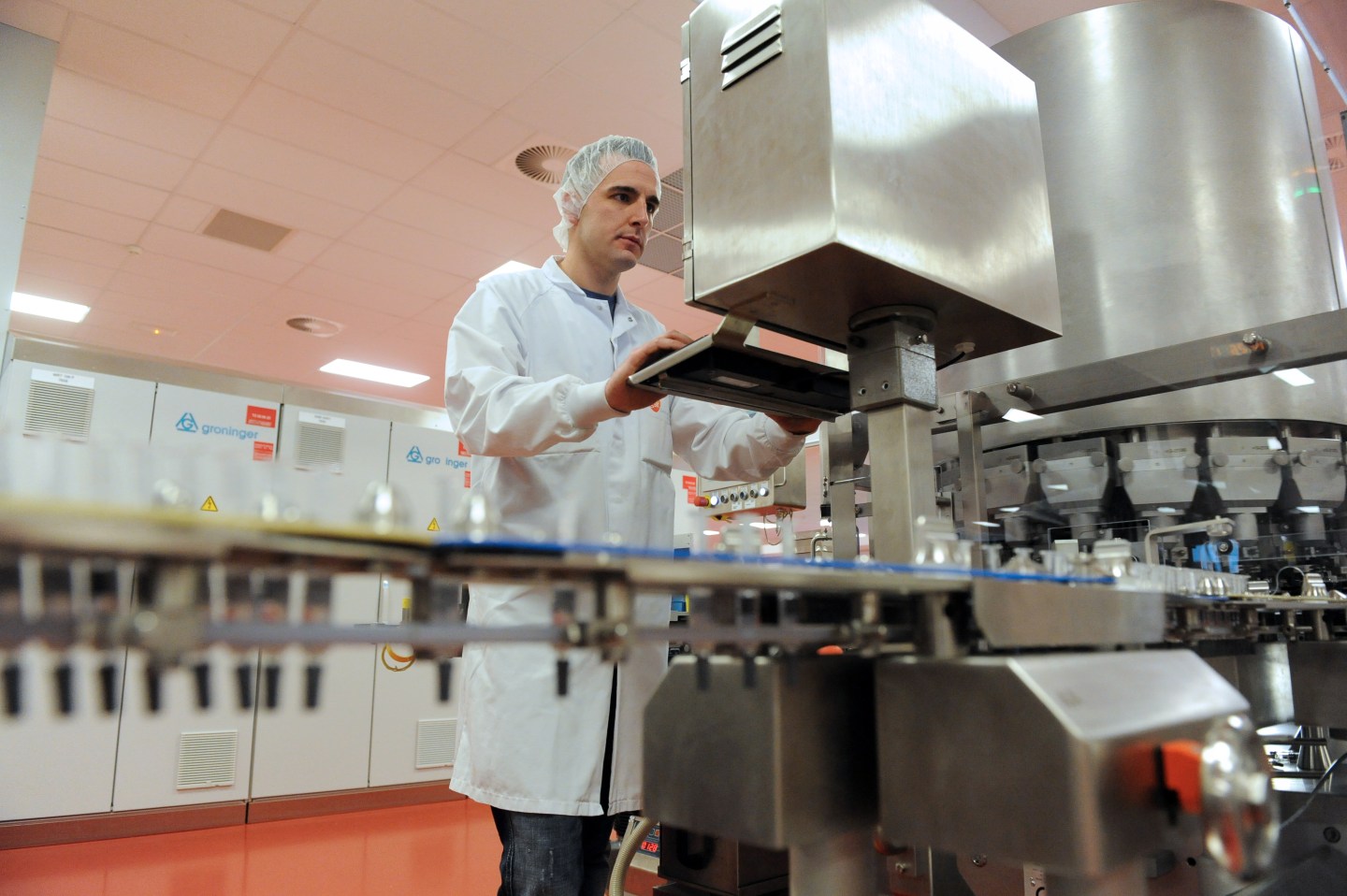 A man is at work at a vaccine production
