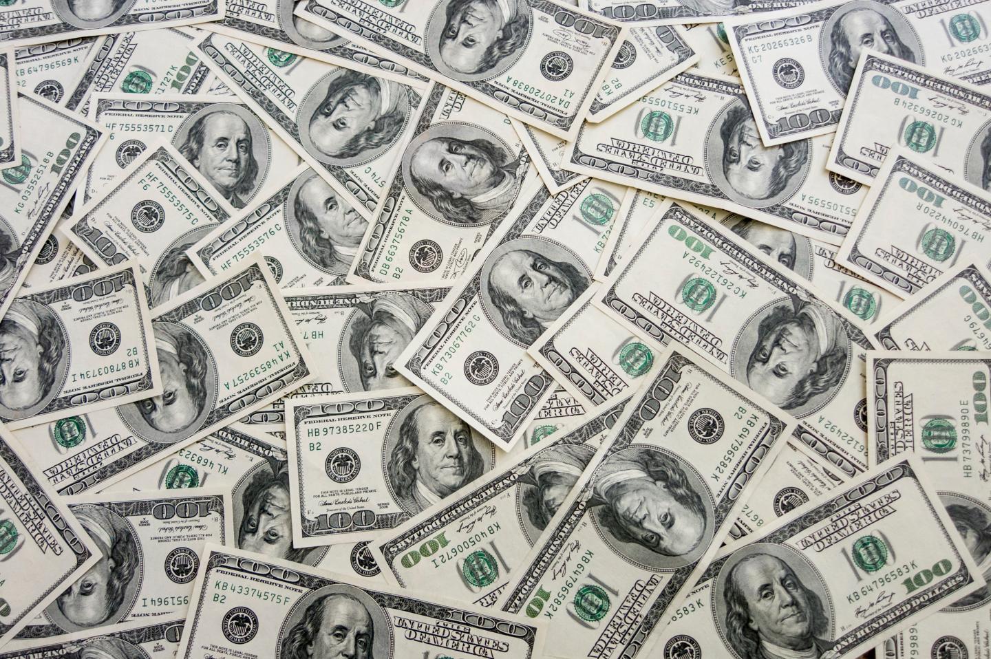 Hundred-dollar bills spread out