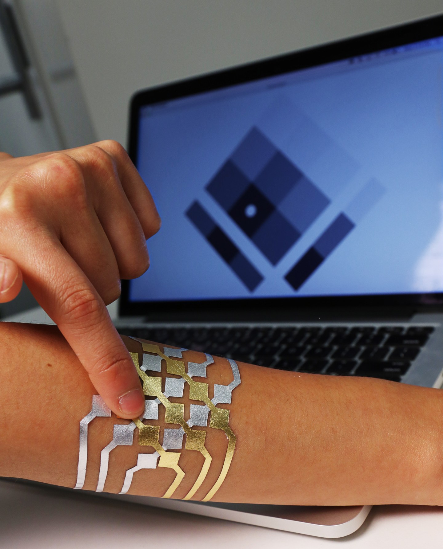 Gold leaf temporary tattoo used as on-skin interface