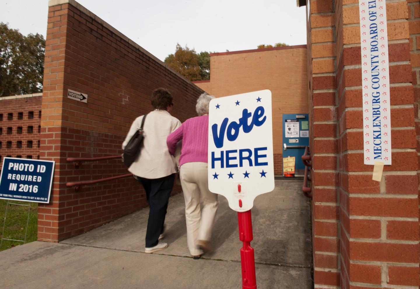 People enter Cotswold School to vote in Charlotte, North Carolina.