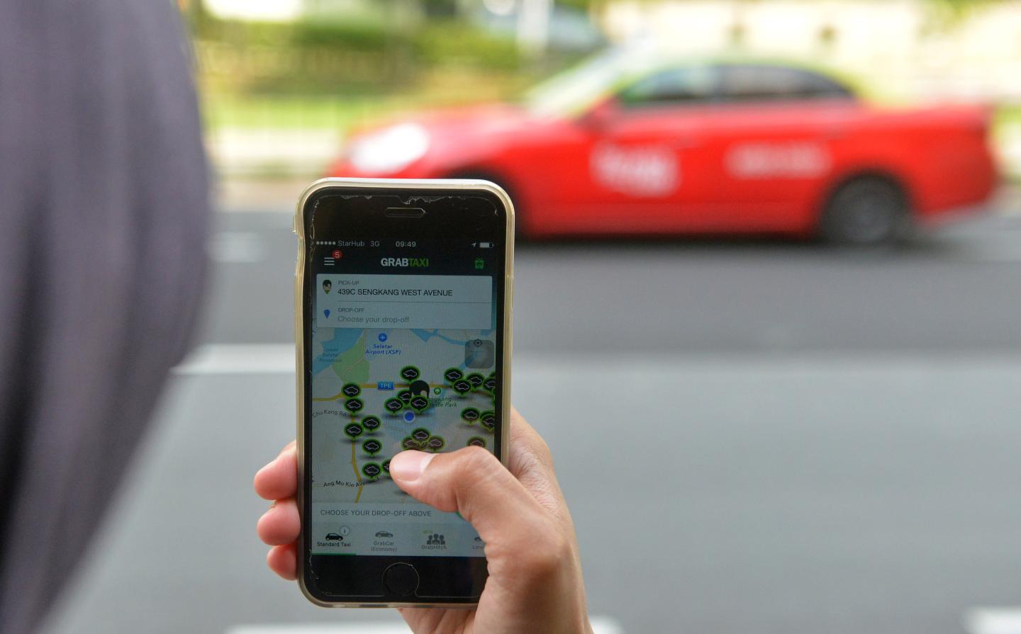 grab uber singapore