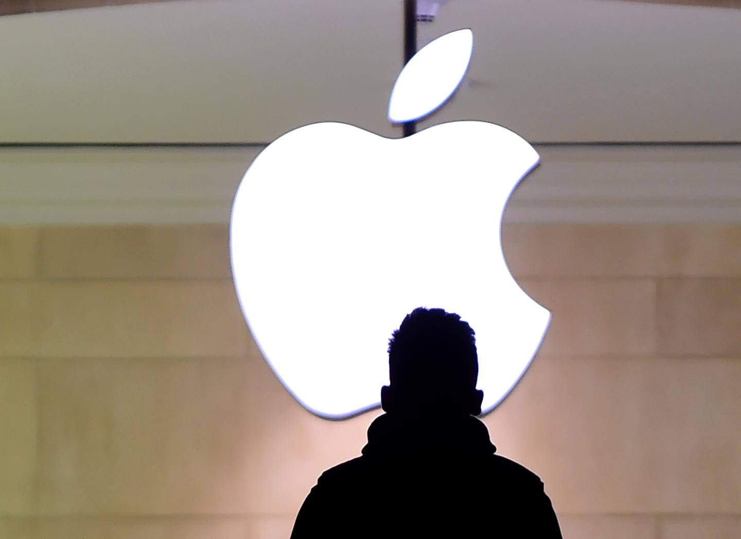 A man walks up the stairs at the Apple Store in Grand Central Station.