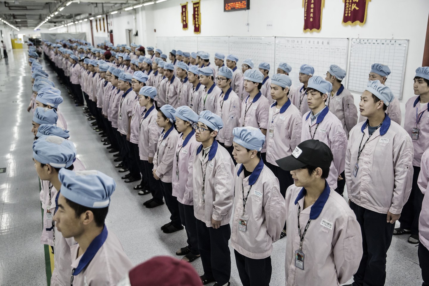 Workers Inside The Pegatron Corp. Factory in Shanghai