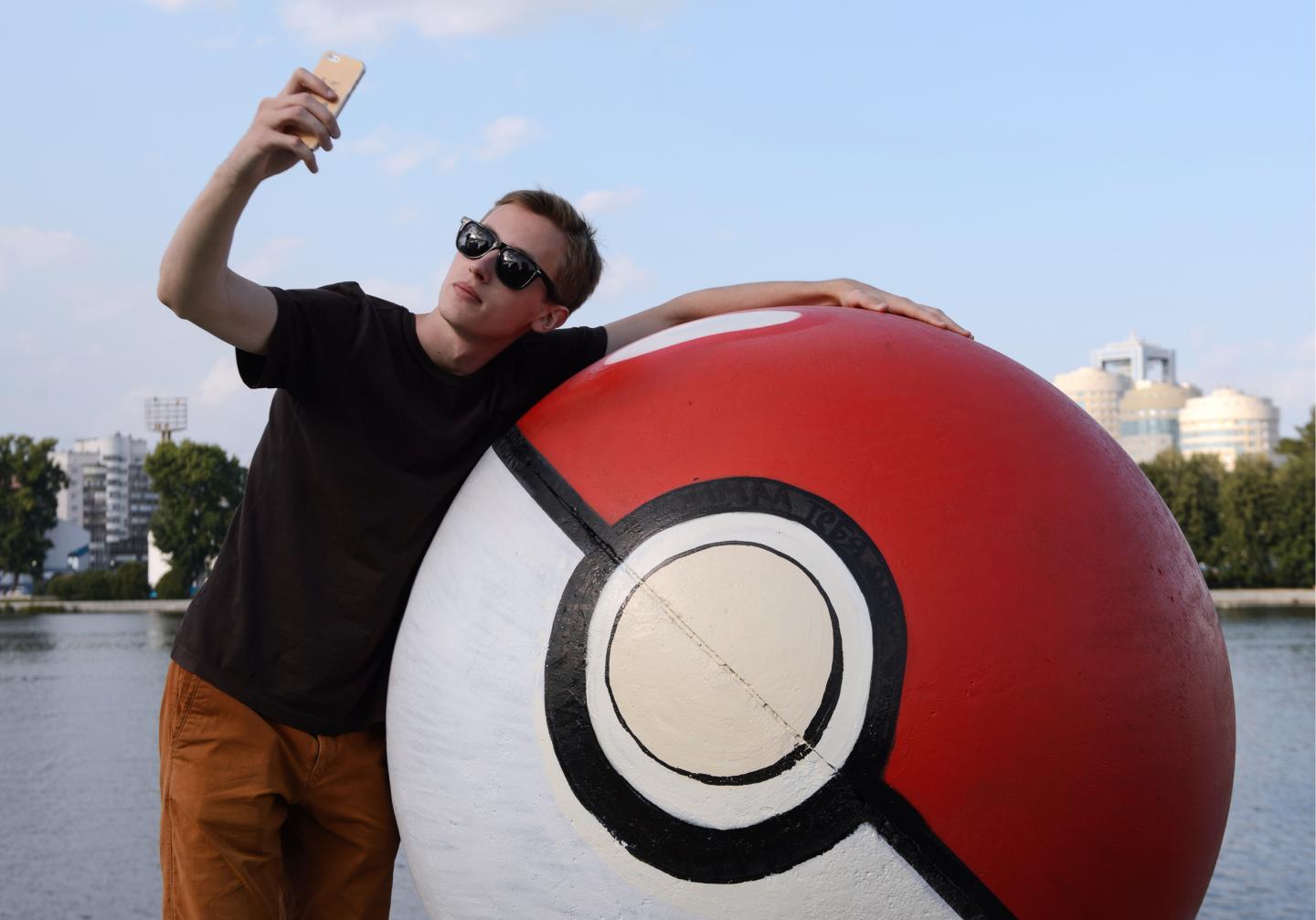 Stone sphere painted as pokeball in Yekaterinburg embankment