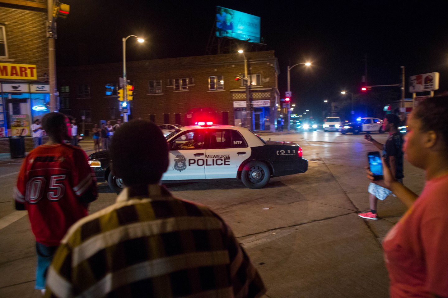 Tensions High In Milwaukee Night After Police Shooting Of Armed Suspect Sparks Violence In City