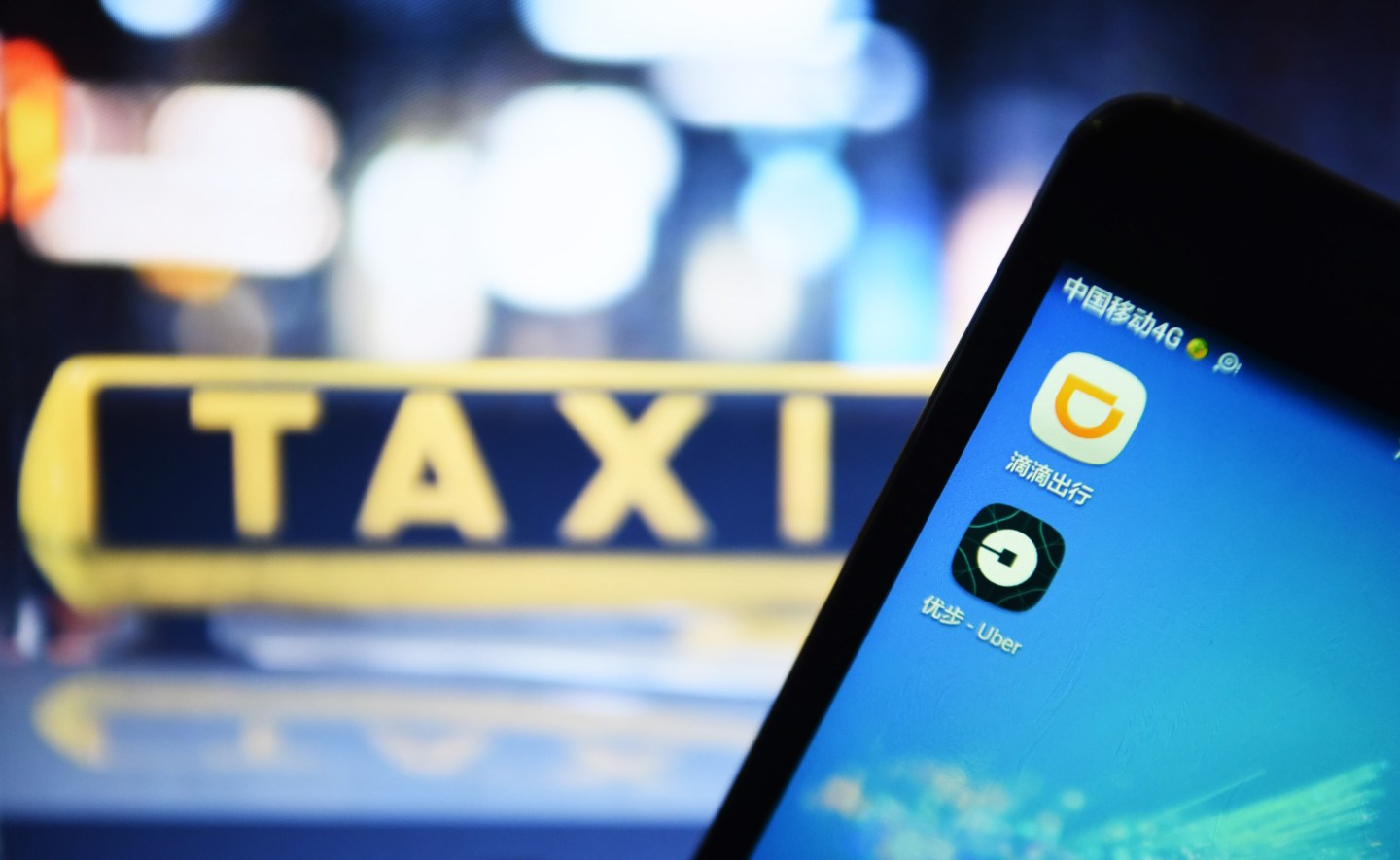 China regulator says Didi, Uber deal will need Mofcom approval