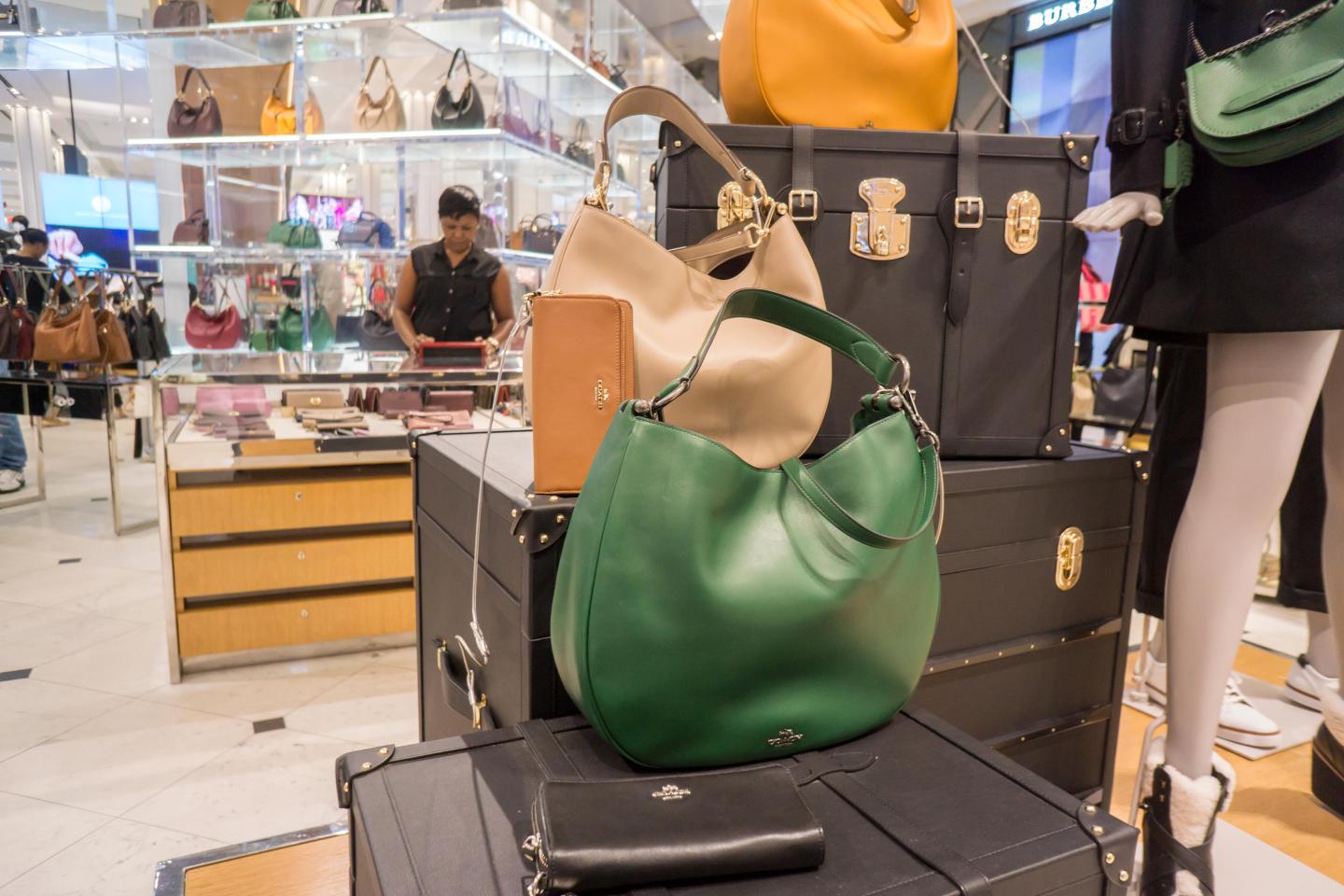Handbags and accessories on display at the Coach boutique within Macy's in New York on Sunday, September 27, 2015. (© Richard B. Levine)