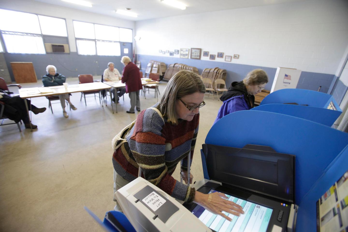U.S. Citizens Head To The Polls To Vote In Presidential Election