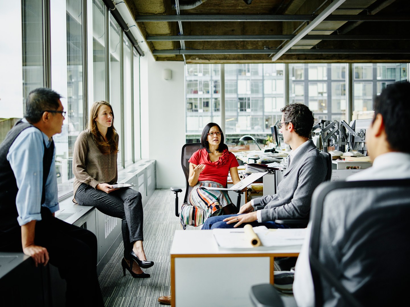 Team of architects having group project discussion