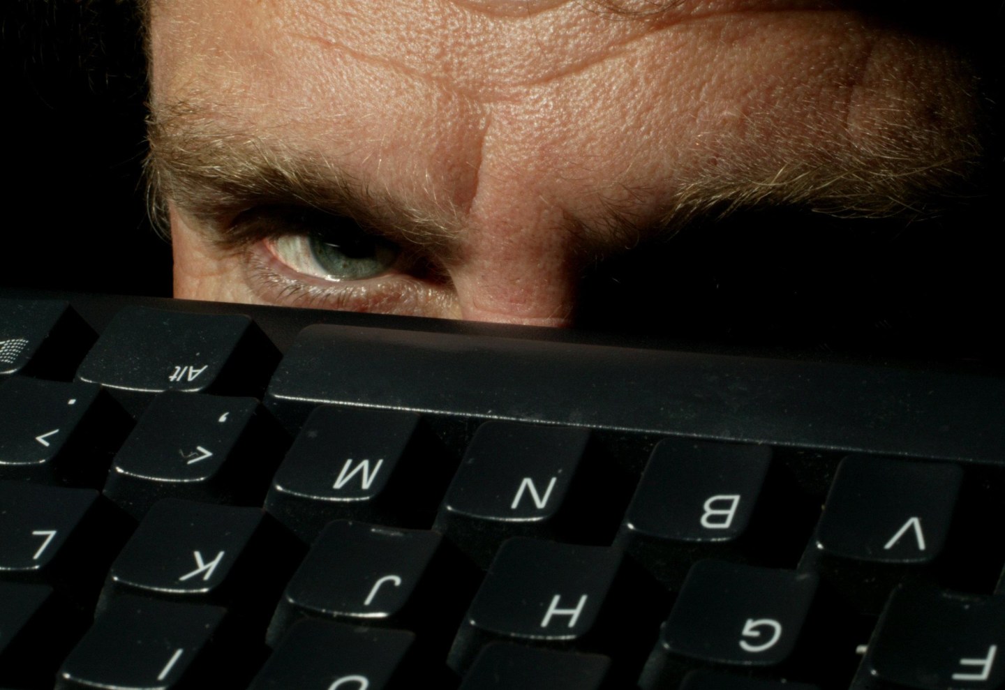 Eye overlooking a computer keyboard