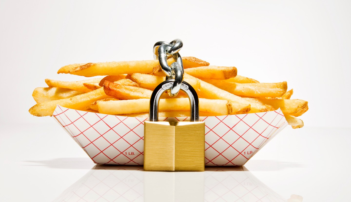 Serving of french fries with lock around them