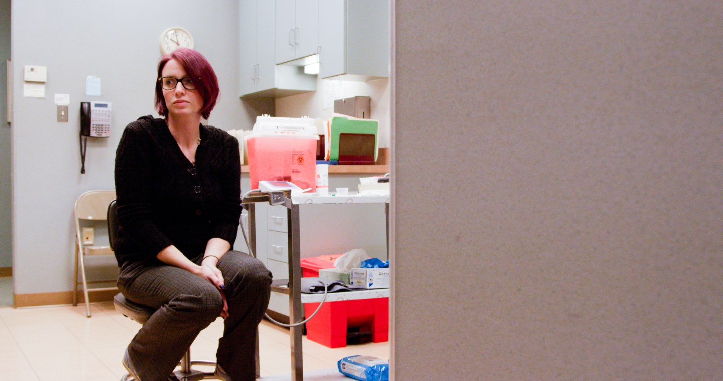 Amie, a woman featured in &#8216;Abortion: The Stories We Tell,&#8217; sits waiting for an appointment at Hope Clinic.