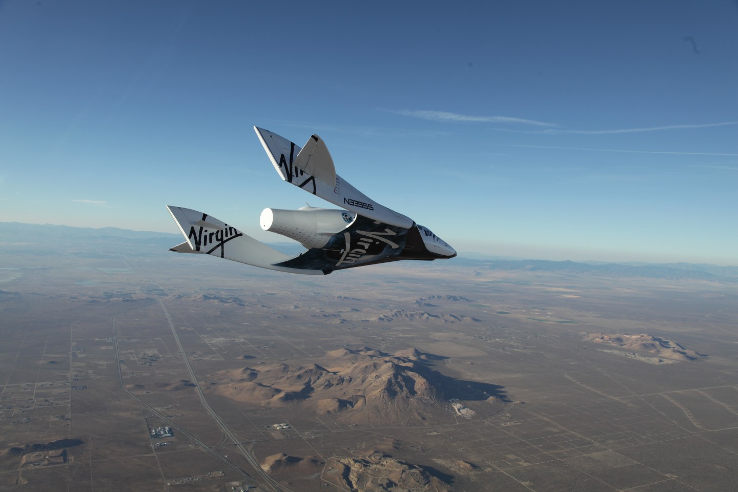 The first SpaceShipTwo during a glide flight over the Mojave desert.