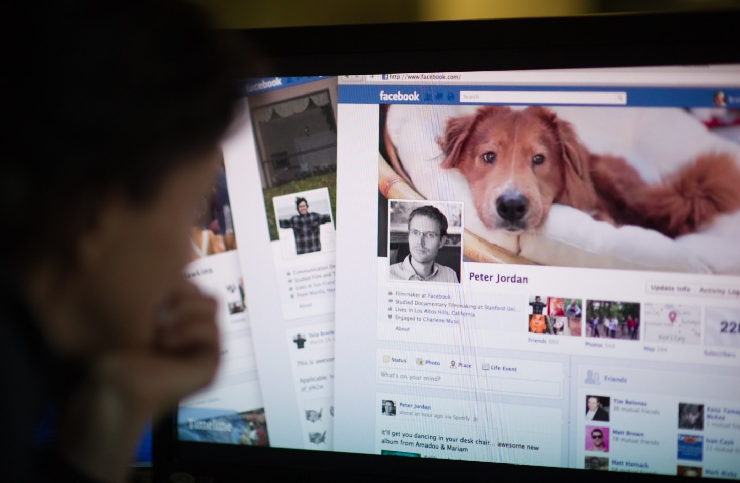 A woman watches a Facebook promotional v