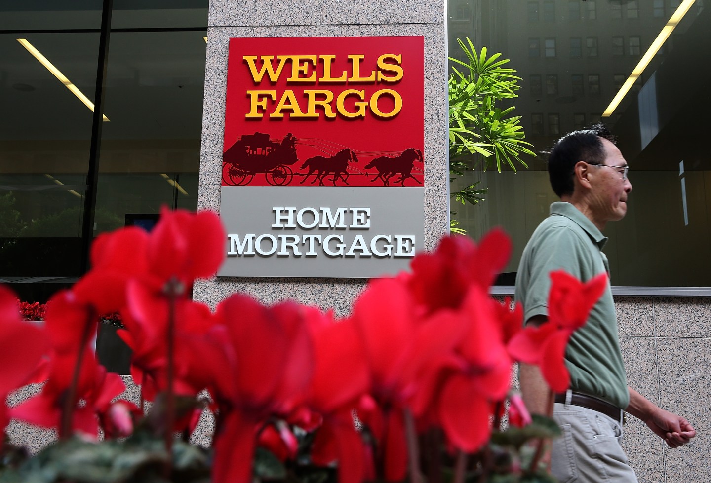 Wells Fargo Reports Quarterly Earnings Rise 13 Percent
