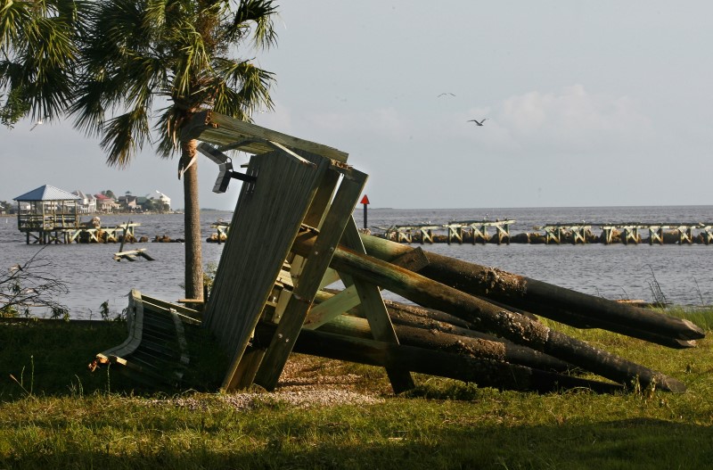 A section of the pier washed up on land as rain and wind from Hurricane Hermine hit the town of Keaton Beach, Florida