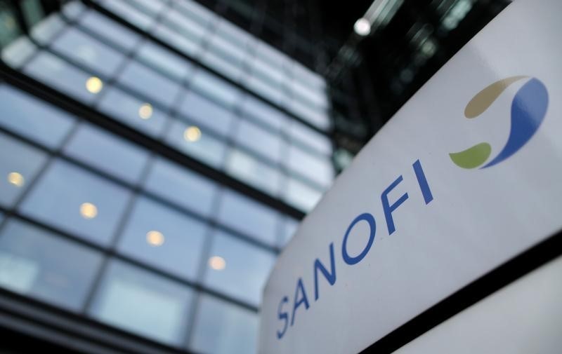 A logo is seen in front of the entrance at the headquarters of French drugmaker Sanofi in Paris