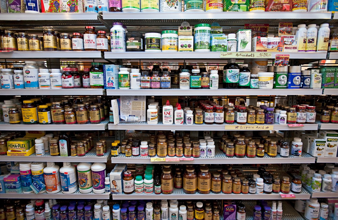 Vitamin and herbal supplement display shelves in a health