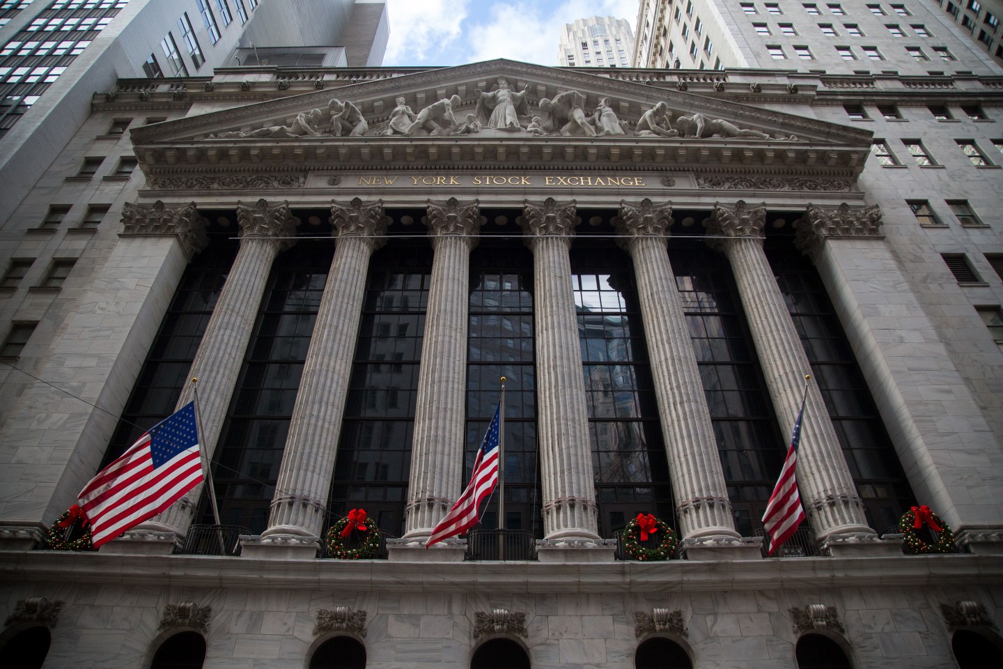 Traders On The Floor Of The NYSE As FOMC Announces Rate Decision