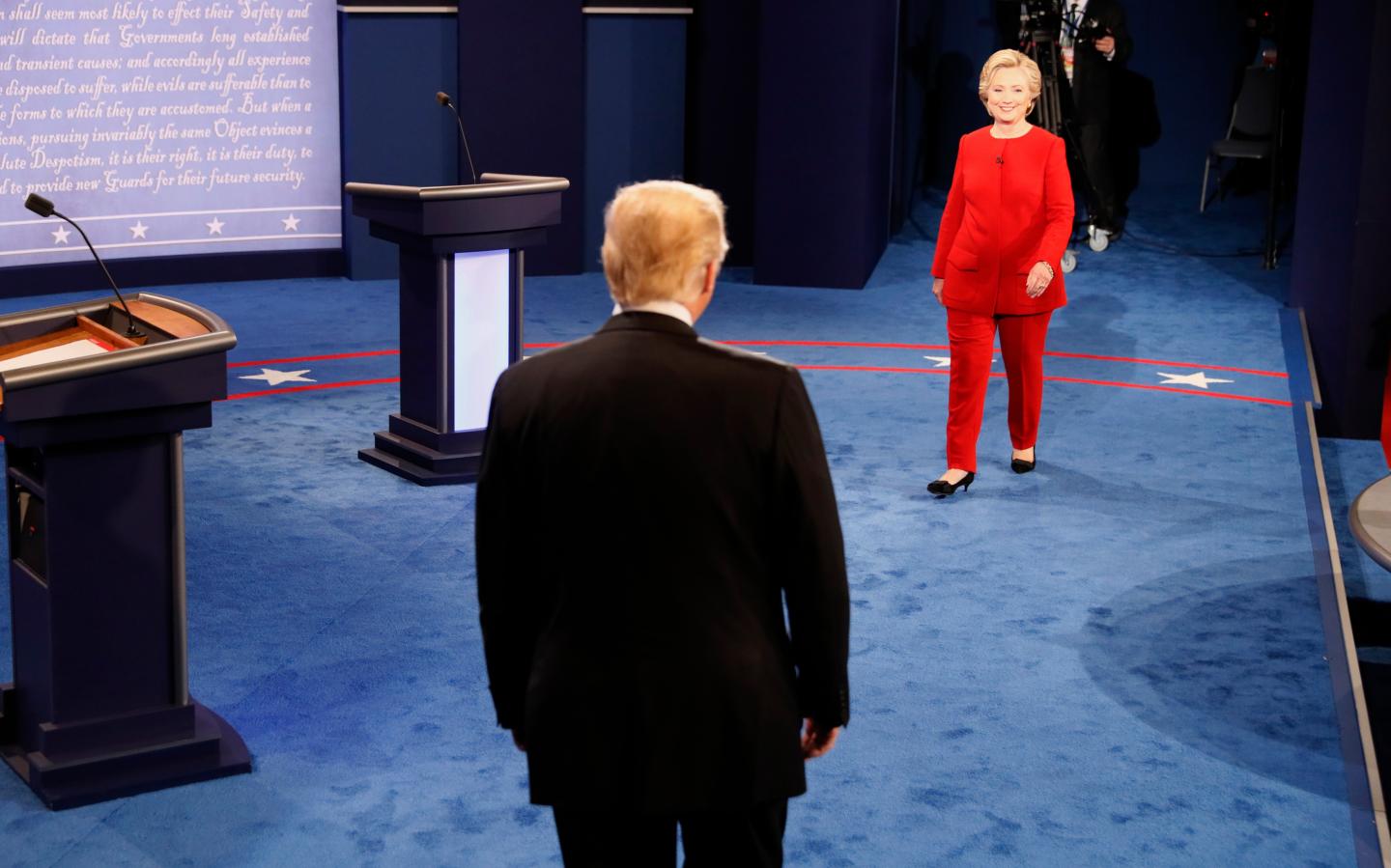 Republican U.S. presidential nominee Donald Trump prepares to shake hands with Democratic U.S. presidential nominee Hillary Clinton at the start of their first presidential debate at Hofstra University in Hempstead