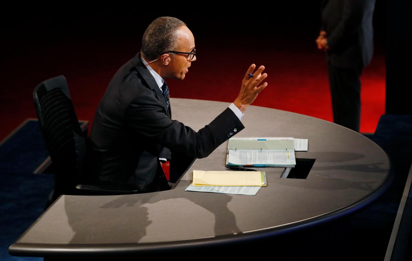 Moderator Lester Holt speaks during the first presidential debate between Democratic U.S. presidential nominee Hillary Clinton and Republican U.S. presidential nominee Donald Trump at Hofstra University in Hempstead