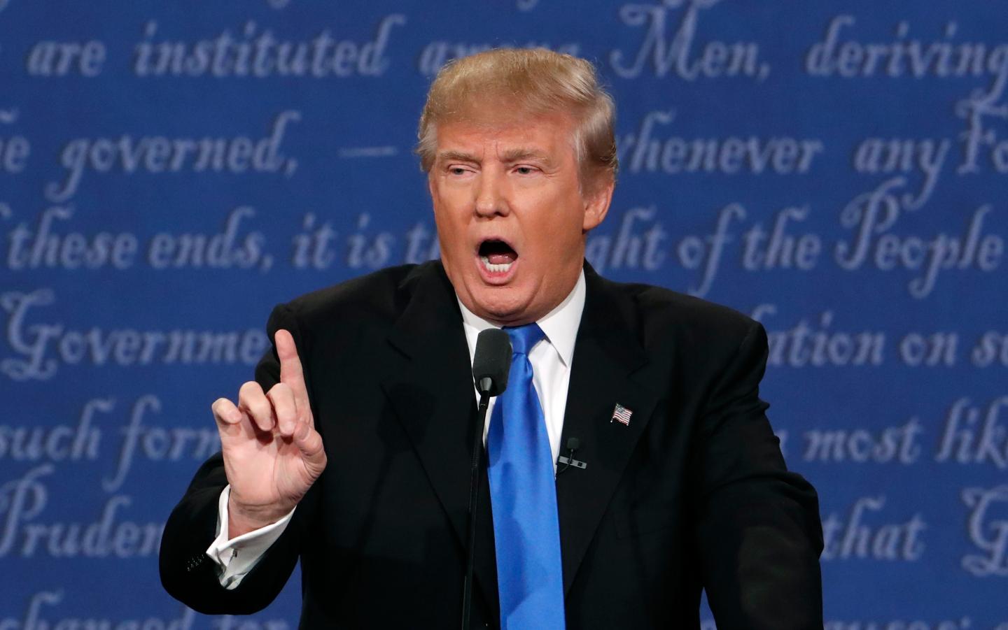 Republican U.S. presidential nominee Donald Trump speaks during the first debate with Democratic U.S. presidential nominee Hillary Clinton at Hofstra University in Hempstead