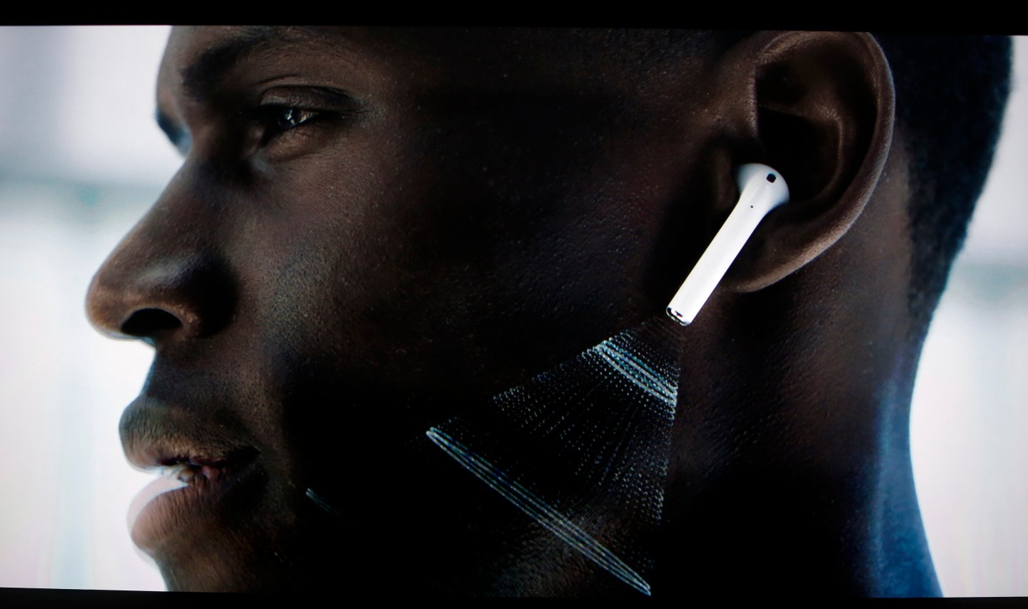Video screen image of Apple AirPods during a media event in San Francisco