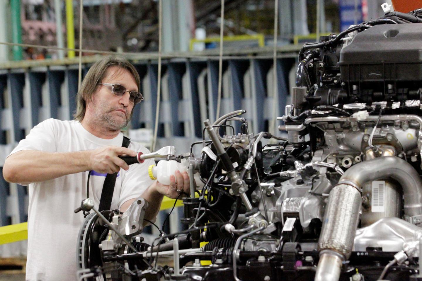 Chrysler Group Celebrates Production Of New 2011 Minivan At Windsor Assembly Plant