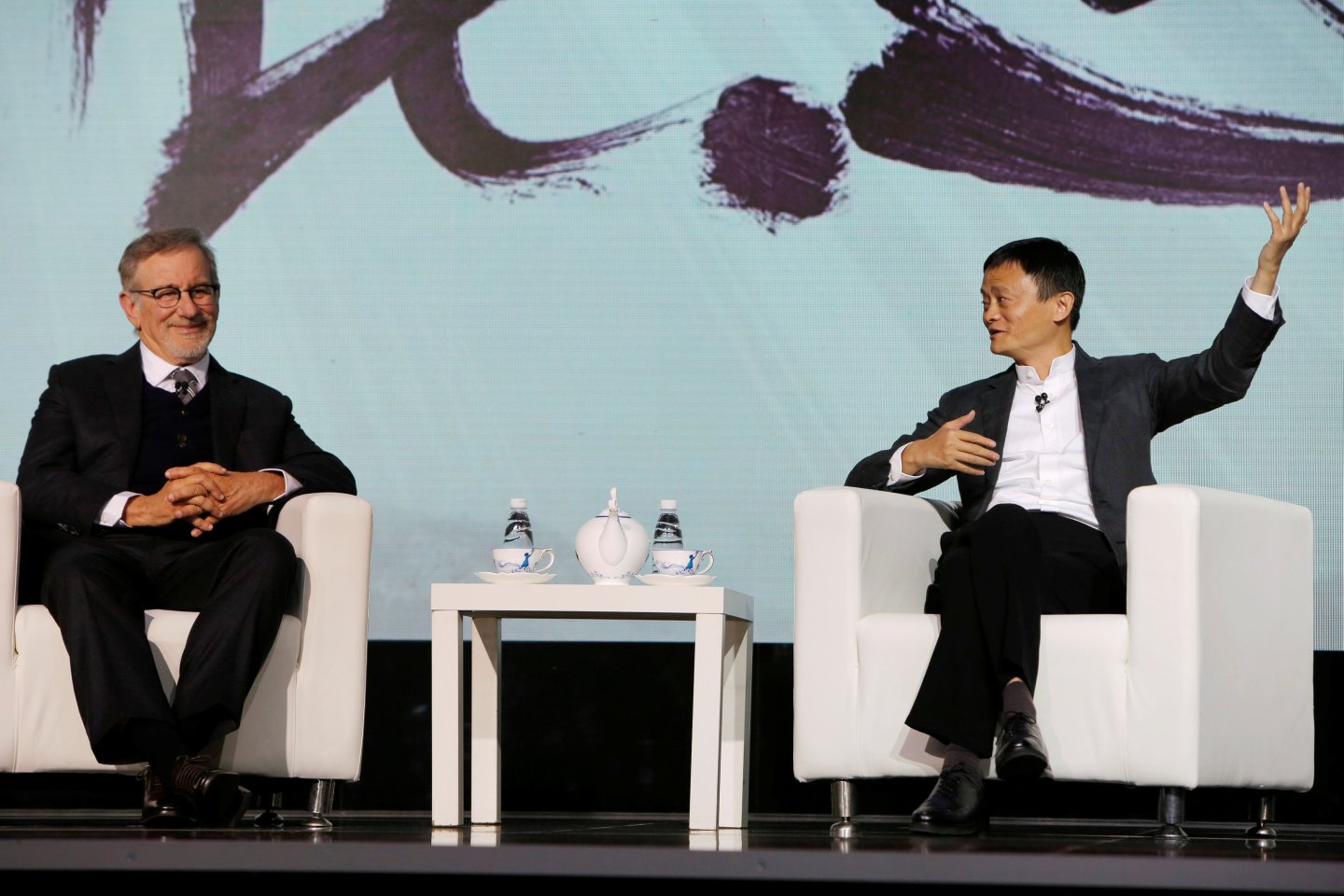 Steven Spielberg (L), film director and Chairman of Amblin Partners and Jack Ma, Chairman and chief executive of Alibaba Group attend an event to announce partnership between Alibaba Pictures Group Limited and Amblin Partners, in Beijing