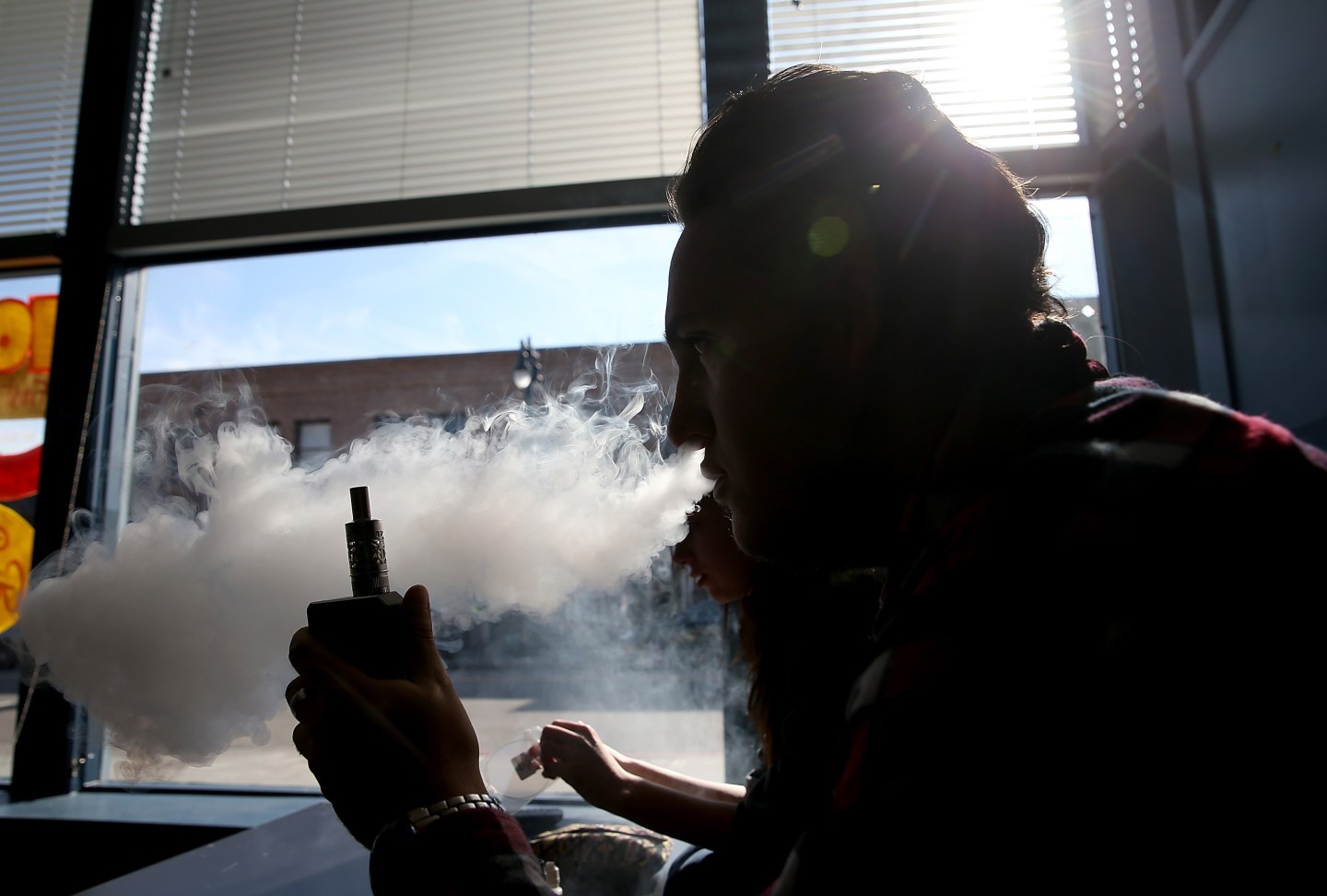 A customer smokes an E-Cigarette at Digita Ciggz on January 28, 2015 in San Rafael, California.
